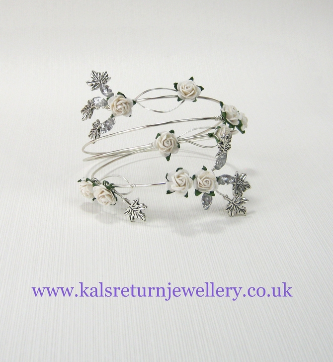 Upper arm cuff silver, ivory roses, leaves. Coordinating colours available