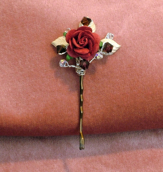 Red rose hair grips with ivory enamel leaves and Garnet Swarovski crystals