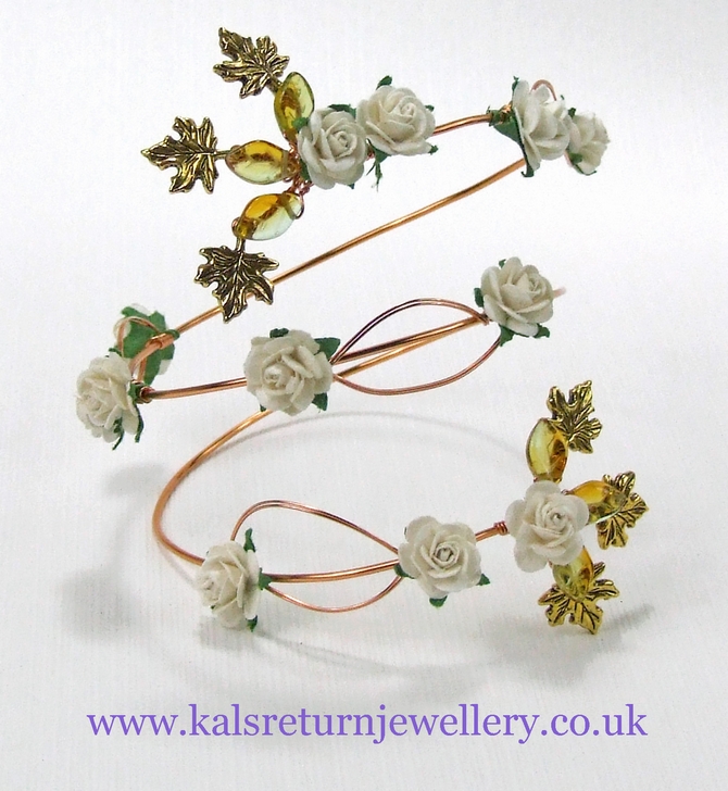 Gold wire wrap arm cuff, ivory flowers and leaves. Boho style.