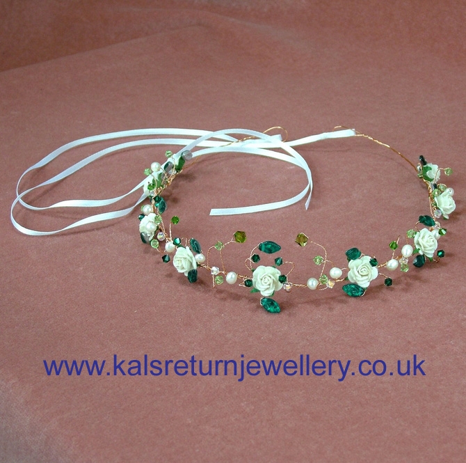 Gold bridal tiara with ivory roses and emerald green crystals